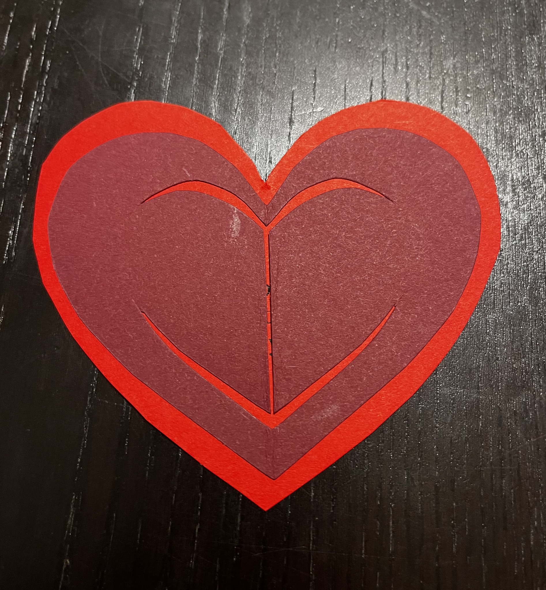 Cut border around heart window flaps