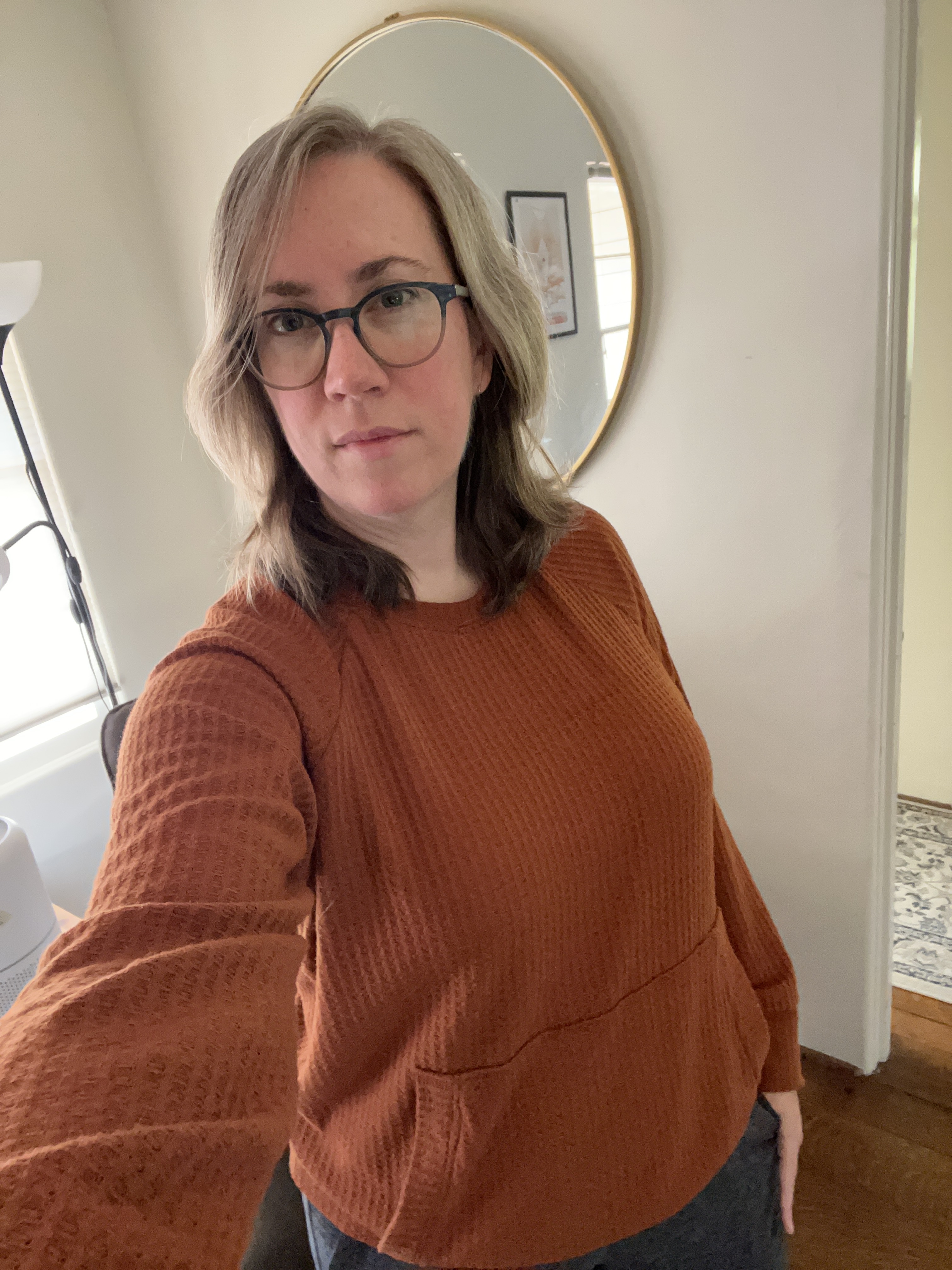 Page sweatshirt in rusty orange with no hood but with front pocket