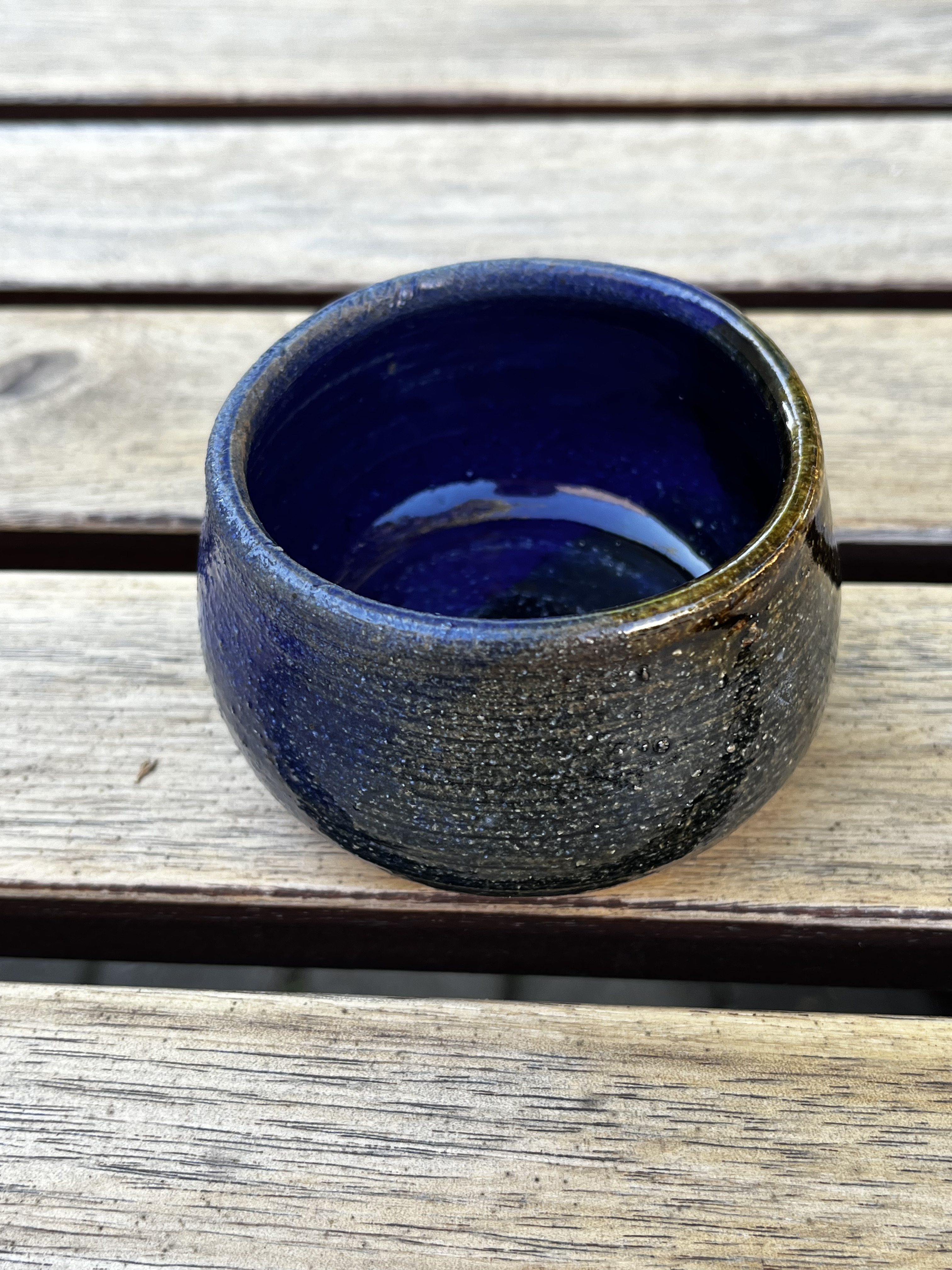 The final fired pot in blue and black.