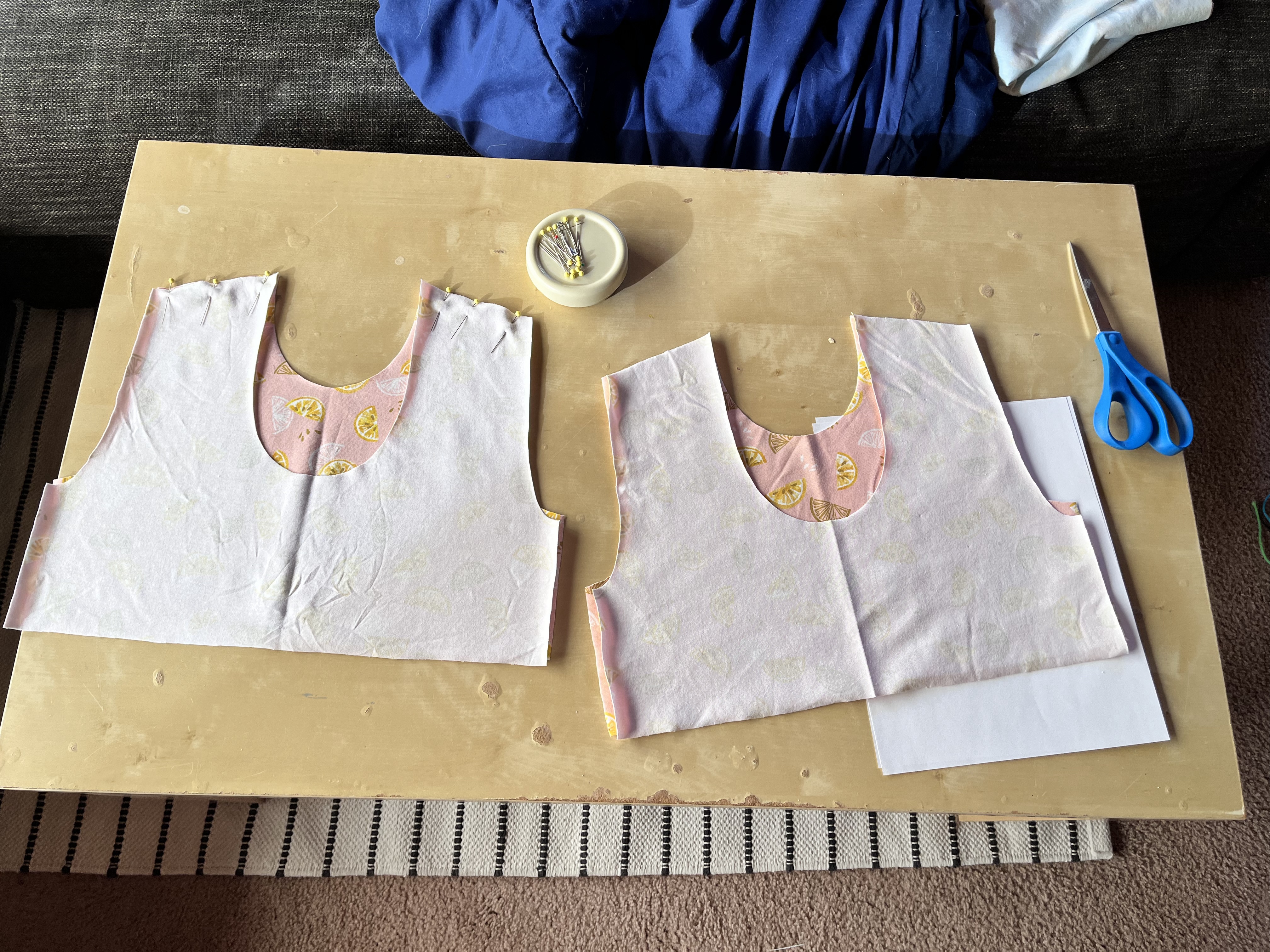 Dress top pieces laid out and pinned together