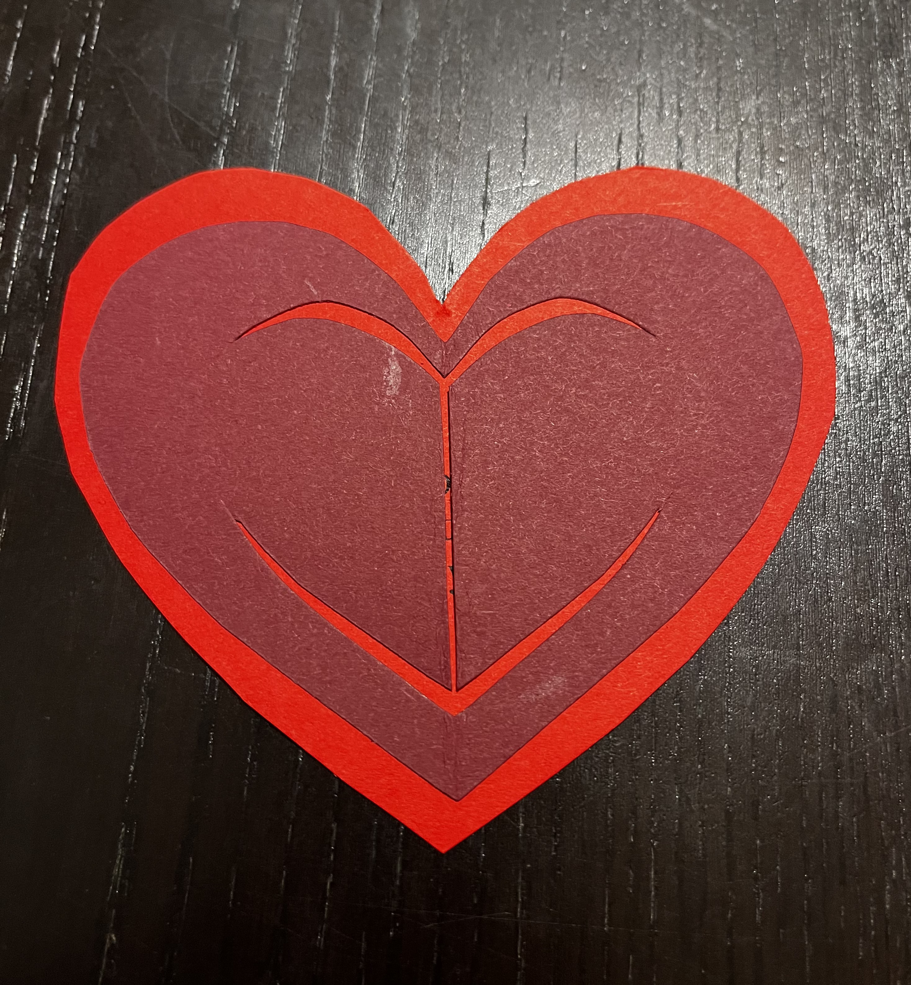 Cut border around heart window flaps