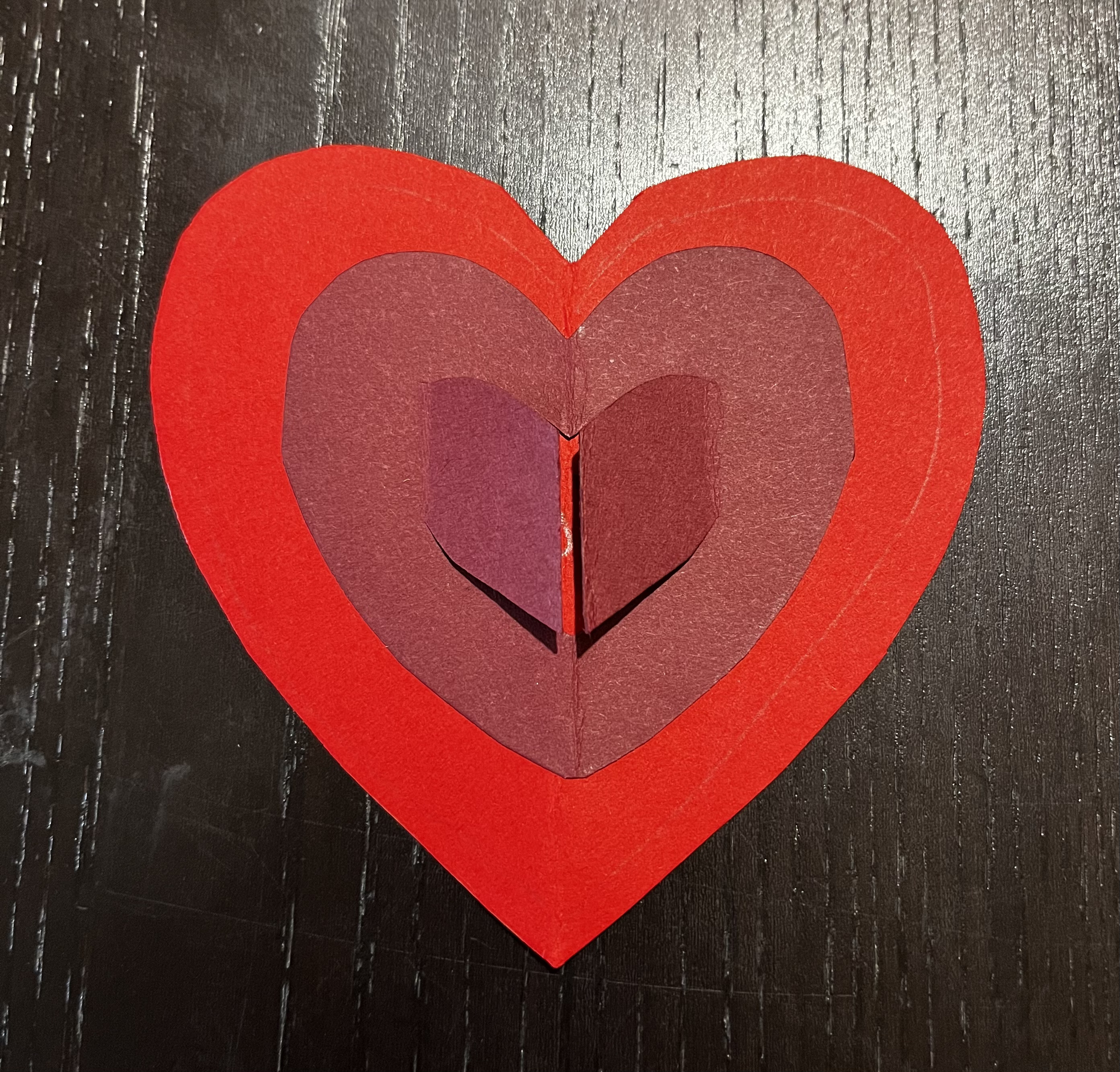 A version of the same heart frame and doors but made with two shades of red card stock.